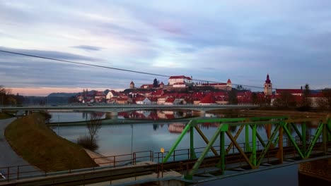 Stunning-4K-drone-footage-of-Ptuj,-the-oldest-recorded-city-in-Slovenia,-inhabited-since-the-late-Stone-Age-and-developed-from-a-Roman-military-fort