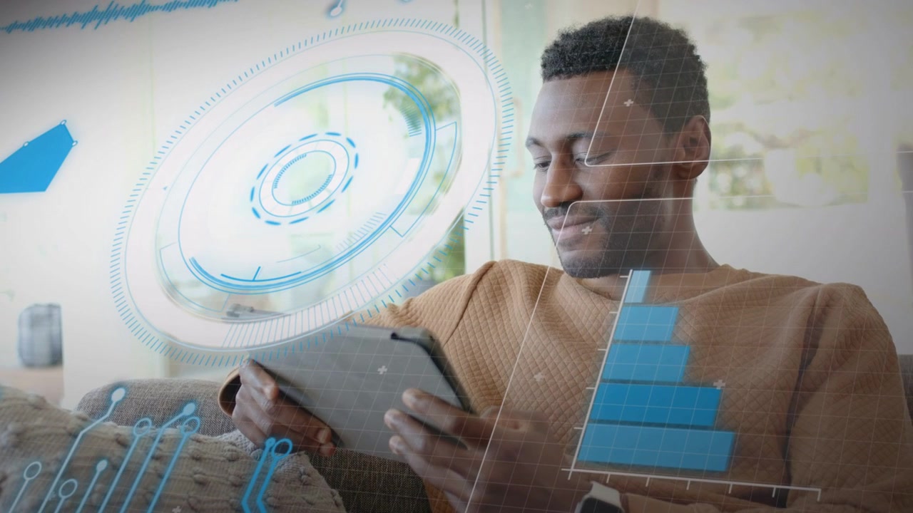 Man on sofa with tablet tapping screen starting finance HUD filling chart around him for audit