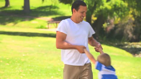 Young-father-playing-with-his-son