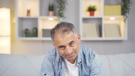 Man-looking-depressed-at-camera.