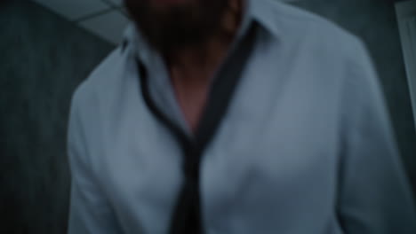 blurred image of a stressed man in an office