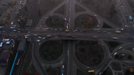 aerial timelapse of road junction, large car interchange. aerial highway junction, colorcorrected 4k footage