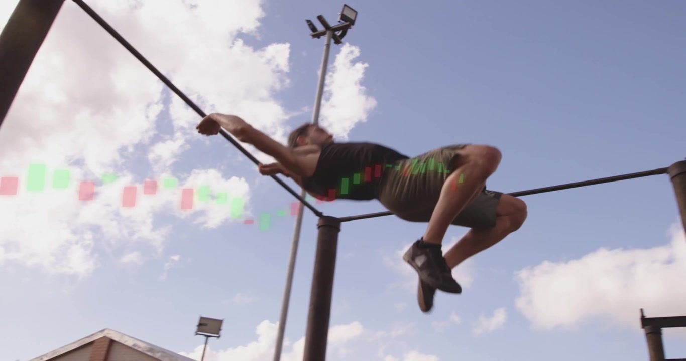 Male athlete swinging legs on high bar, flipping and transferring grip, climbing rig for fitness