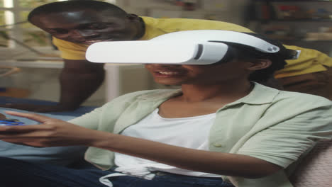 african american couple playing game in vr
