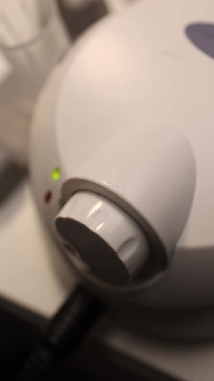 Close-up of a nail drill and control unit