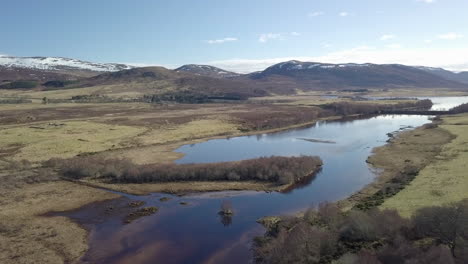 aerial footage of loch mhor on a sunny day, scottish highlands, scotland