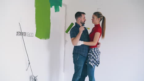 family-dances-painting-wall-and-each-other-at-room-renewal