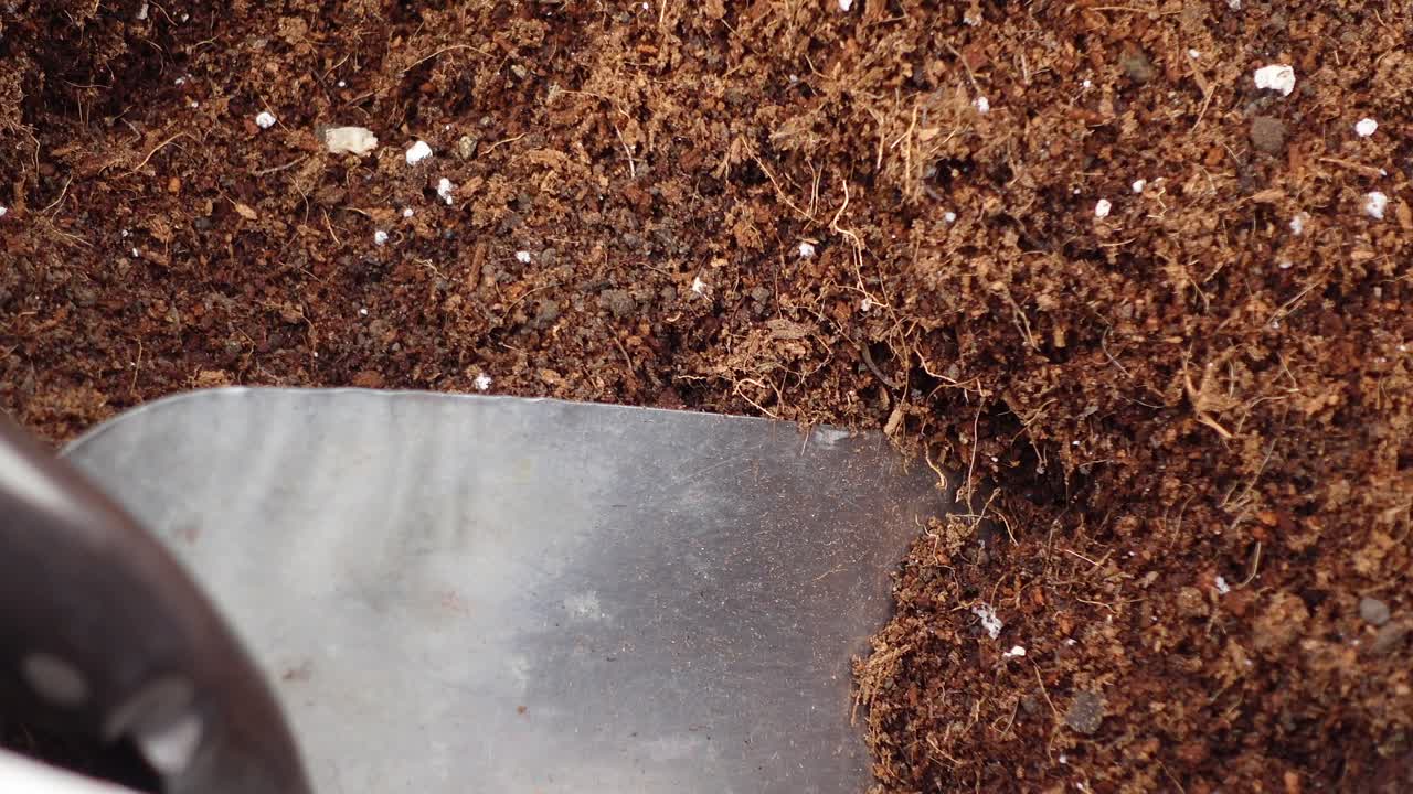 Potting mix and gardening tools