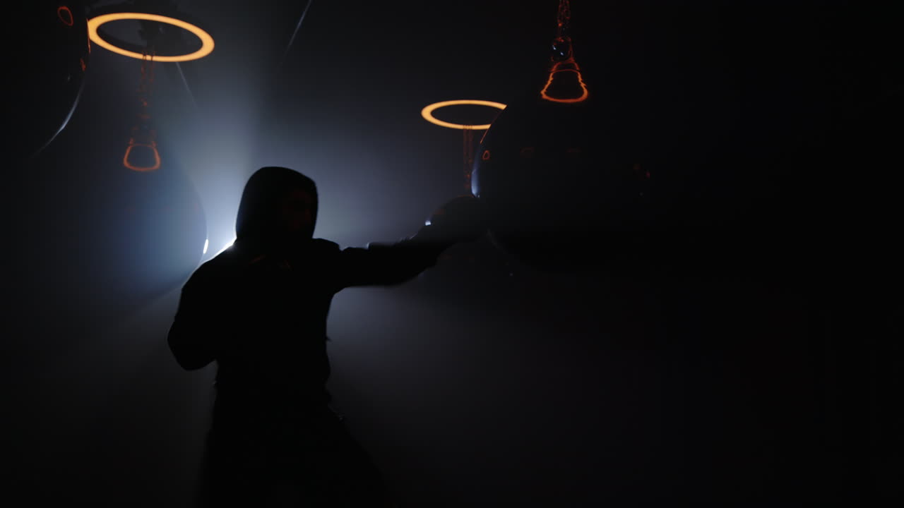 Person Practicing Boxing in a Gym