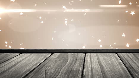 animation of stars falling over wooden surface and beige background