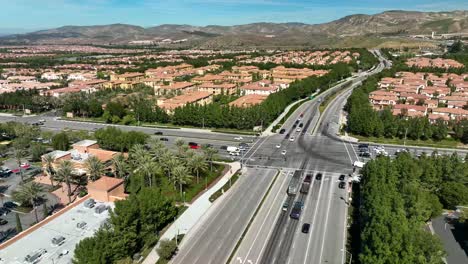 semi busy intersection with cars and crosswalk