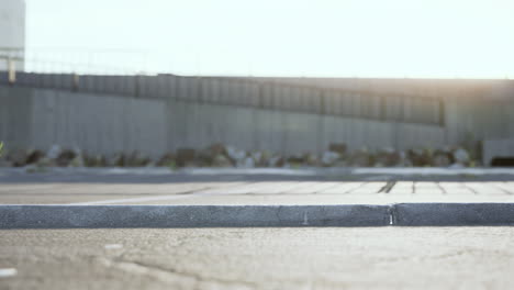 empty urban parking lot with curb