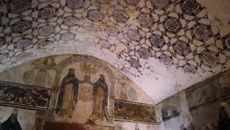 Panoramic detailed shot of mural paintings on the altarpiece wall and single nave interior of the ex-convent in Tepoztlán, Mexico