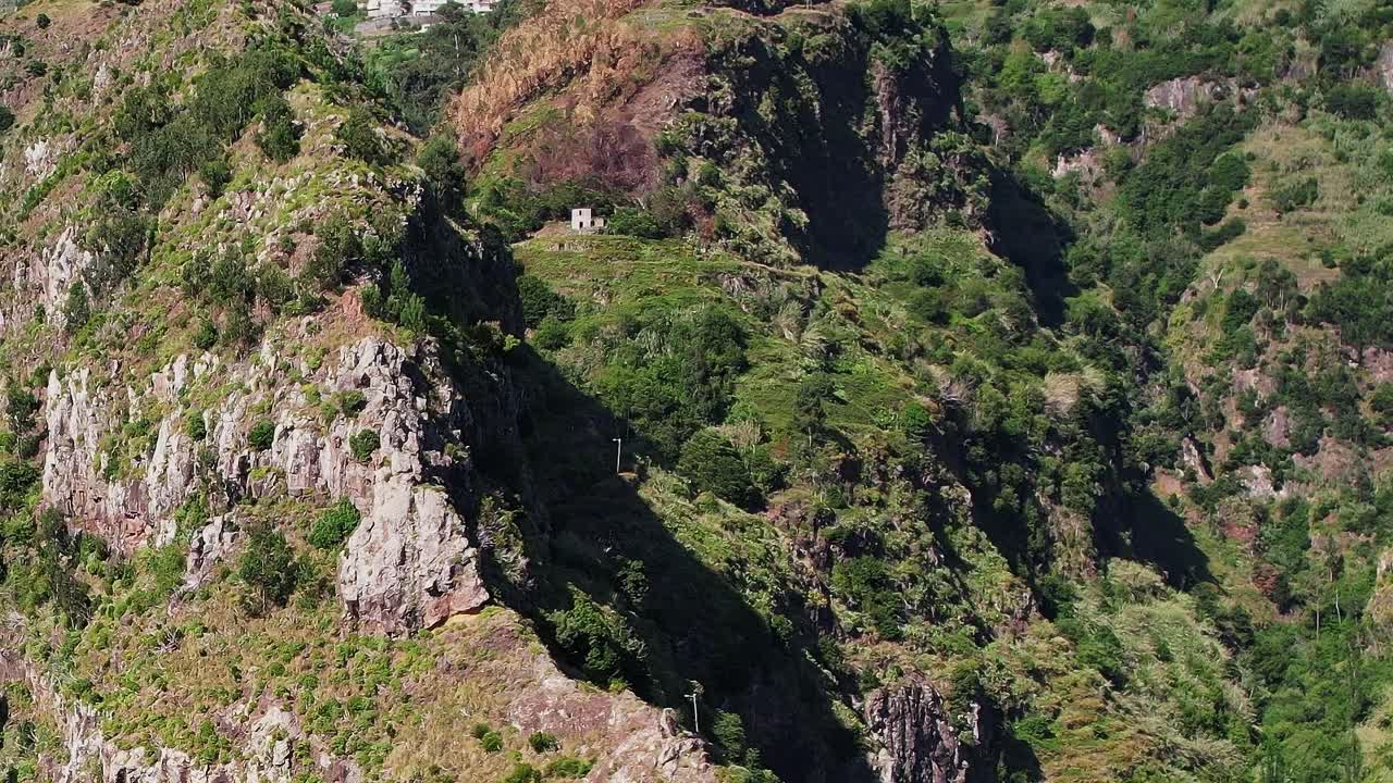 Explore stunning aerial views of Madeira's rugged terrain in Portugal