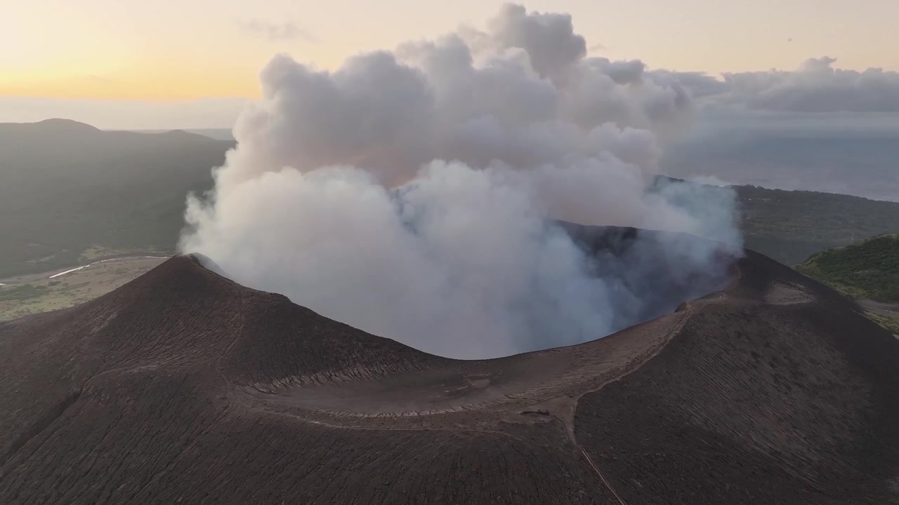 Breathtaking aerial view of smoke from active volcano during sunset in Vanuatu. Mount Yasur.