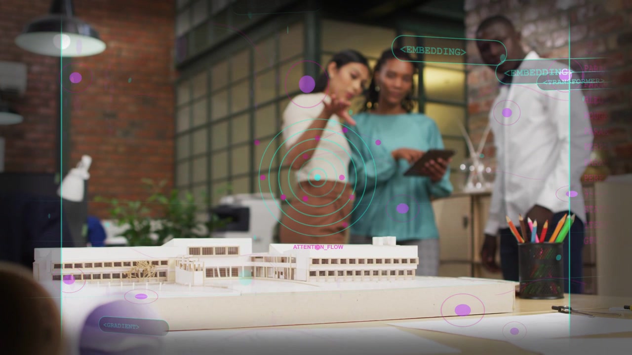 Design team pointing at model, scrolling tablet causing AR overlays marking hotspots for review