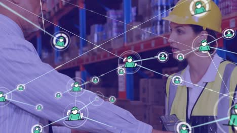 Network-of-profile-icons-over-male-supervisor-and-female-worker-using-scanning-device-at-warehouse