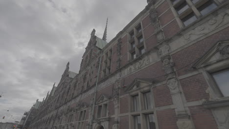 Shot-of-the-Borson-building-in-Copenhagen-filmed-from-below-on-a-cloudy-day-LOG