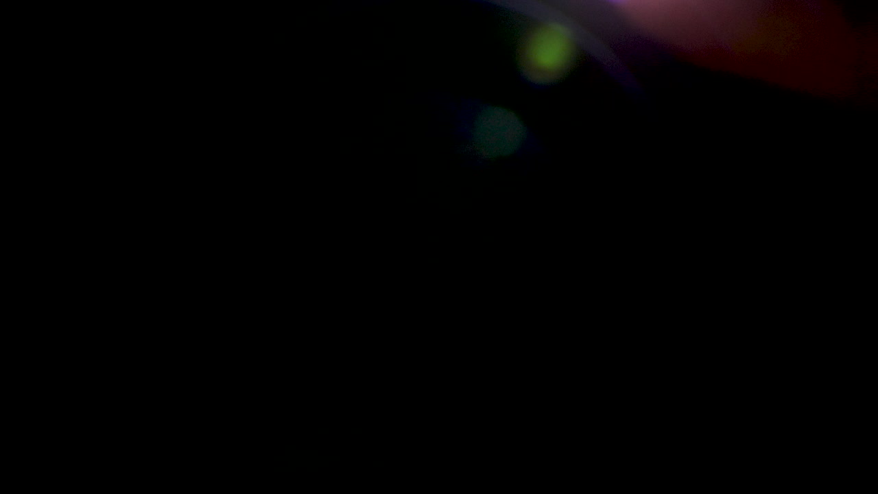 Lens flares effects on black background