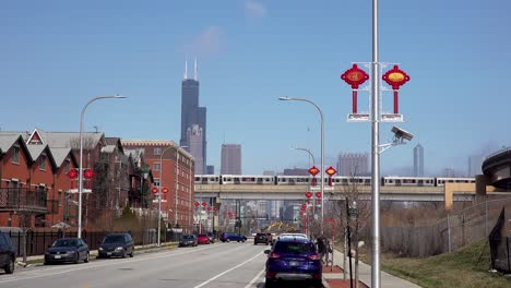 cars and subway in chinese asian neighborhood community city of chicago