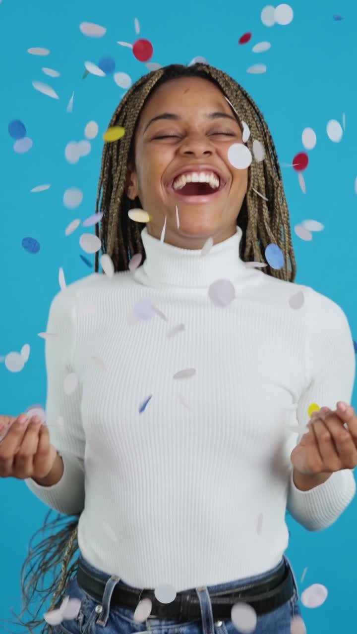 Joyful Woman Celebrating with Confetti