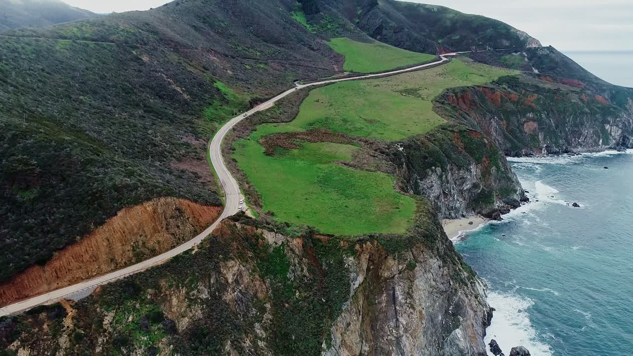 Coastal road winding along steep cliffs on the way from San Francisco to LA
