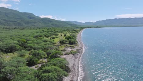Forward-drone-view-along-Ocoa-Bay,-Azua,-Dominican-Republic