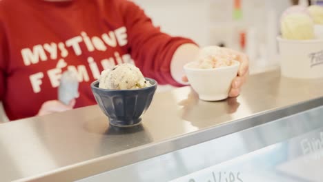 ice cream scoop on a counter at a shop