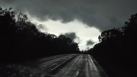 driving through an empty narrow area during calm, yet daunting weather