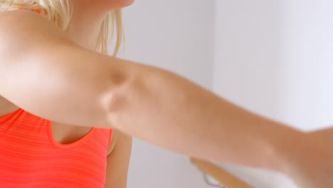 woman doing exercise in fitness studio 4k