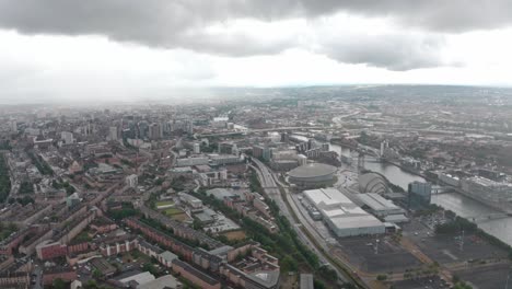 descending drone shot over central glasgow in the rain