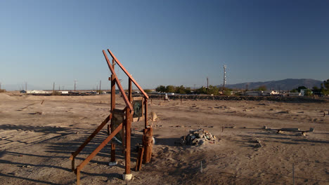 wooden church cross structure at bombay beach on the shoreline of salton sea in california, usa