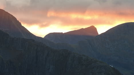 cloudscape of norwegian mountains in the backround