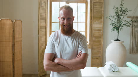 man posing in the massage room