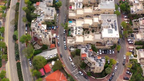 aerial view of a residential neighborhood with diverse architecture and green areas
