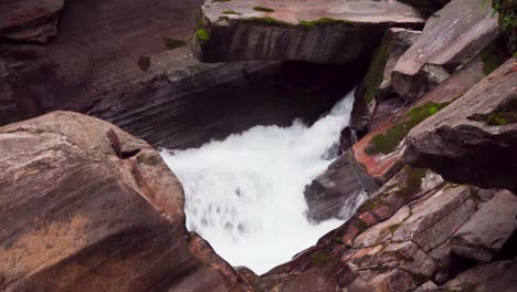 The-River-Pfelderer-squeezes-through-a-narrow-part-between-rocks-in-Passeier-Valley,-South-Tyrol,-Italy