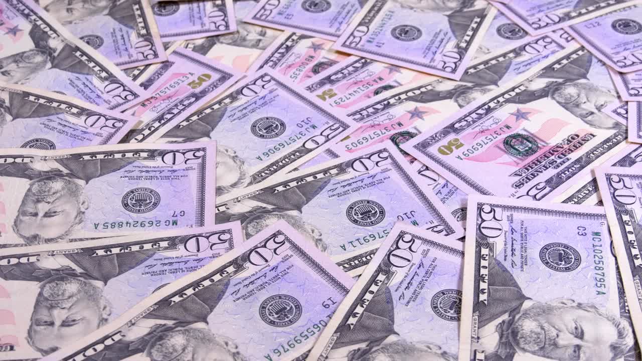 fondo de los billetes estadounidenses de valor de 50 dólares girar