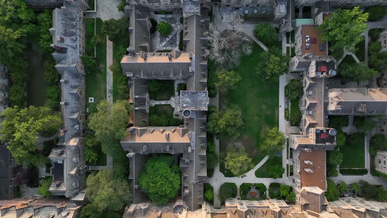 Aerial Top-down of Yale University’s gothic architecture, historic courtyards and symmetrical campus layout in New Haven, Connecticut. Sunny day in summer