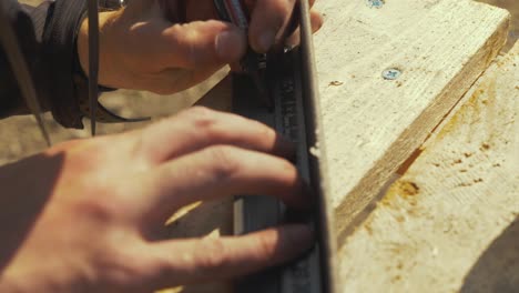 Marking angle iron for drilling holes to build fencing