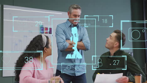 data analysis and facial recognition animation over diverse team in office meeting