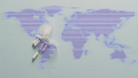 animation of tablets and processing data over purple world map on grey background