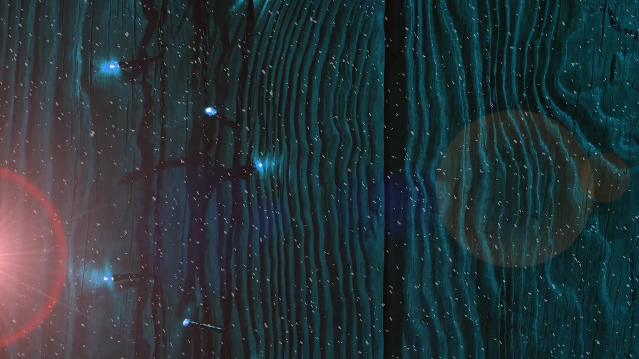 Animation of bokeh effect and abstract pattern against illuminated wooden fence