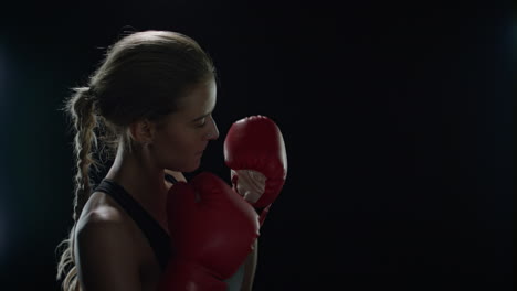 Woman-boxer-kicking-air-in-slow-motion