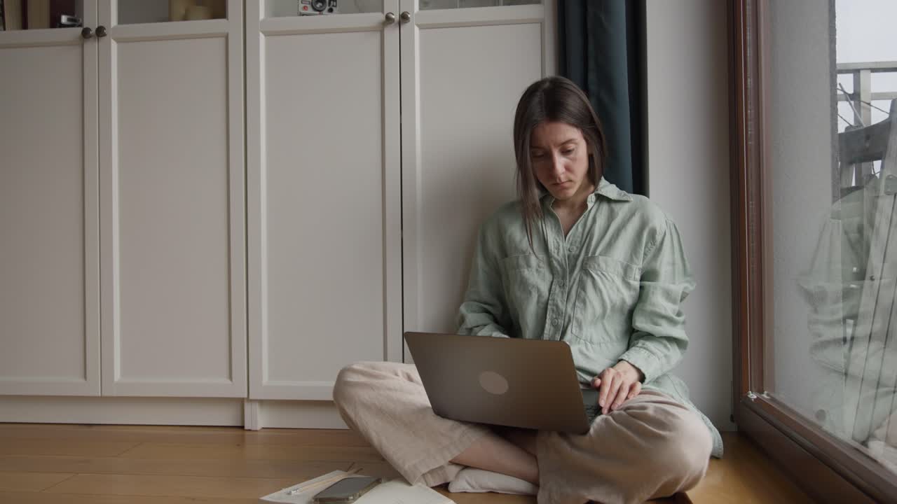 Woman working from home on laptop