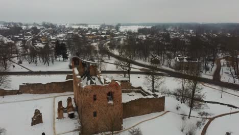 ruins of ancient livonian order's stone medieval castle latvia aerial drone top shot from above