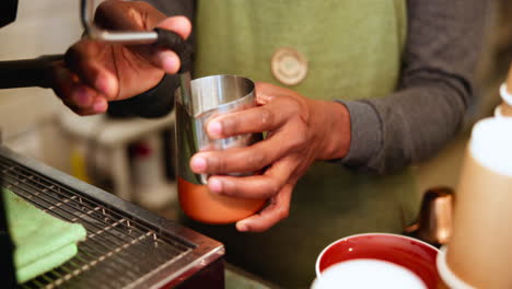 barista preparing coffee with espresso machine