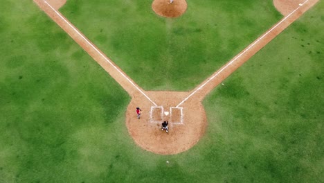 san pedro de macoris, dr - march 12, 2021 - aerial view drone young people playing baseball at stadium in san pedro, training session