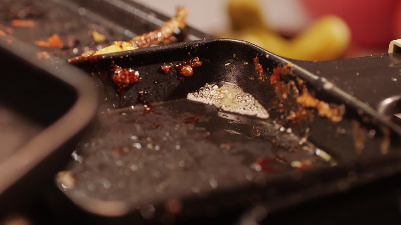 Dirty dishes and mess after a party at home close-up. Christmas table after the holiday celebrating. Cleaning the house after dinner with friends and family. Home cleaning services