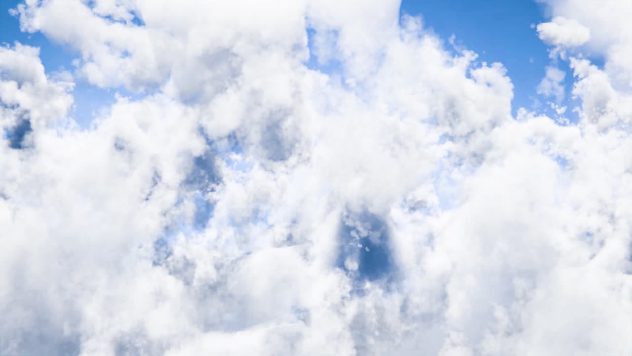 Fluffy White Clouds Floating in a Clear Blue Sky