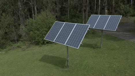 camera orbits around solar panels within a lush green landscape, showcasing the harmony of technology and nature